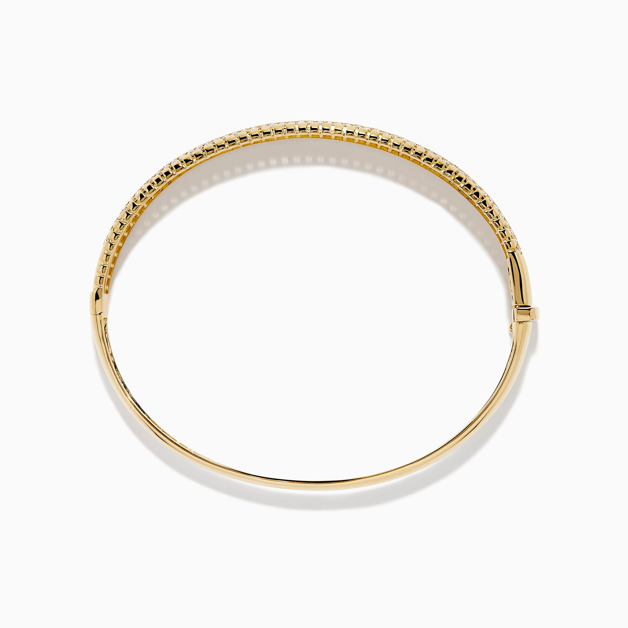 The D'Oro 14K Yellow Gold Diamond Bangle showcases rows of sparkling center diamonds, a textured border, and a secure hinged clasp for timeless elegance.