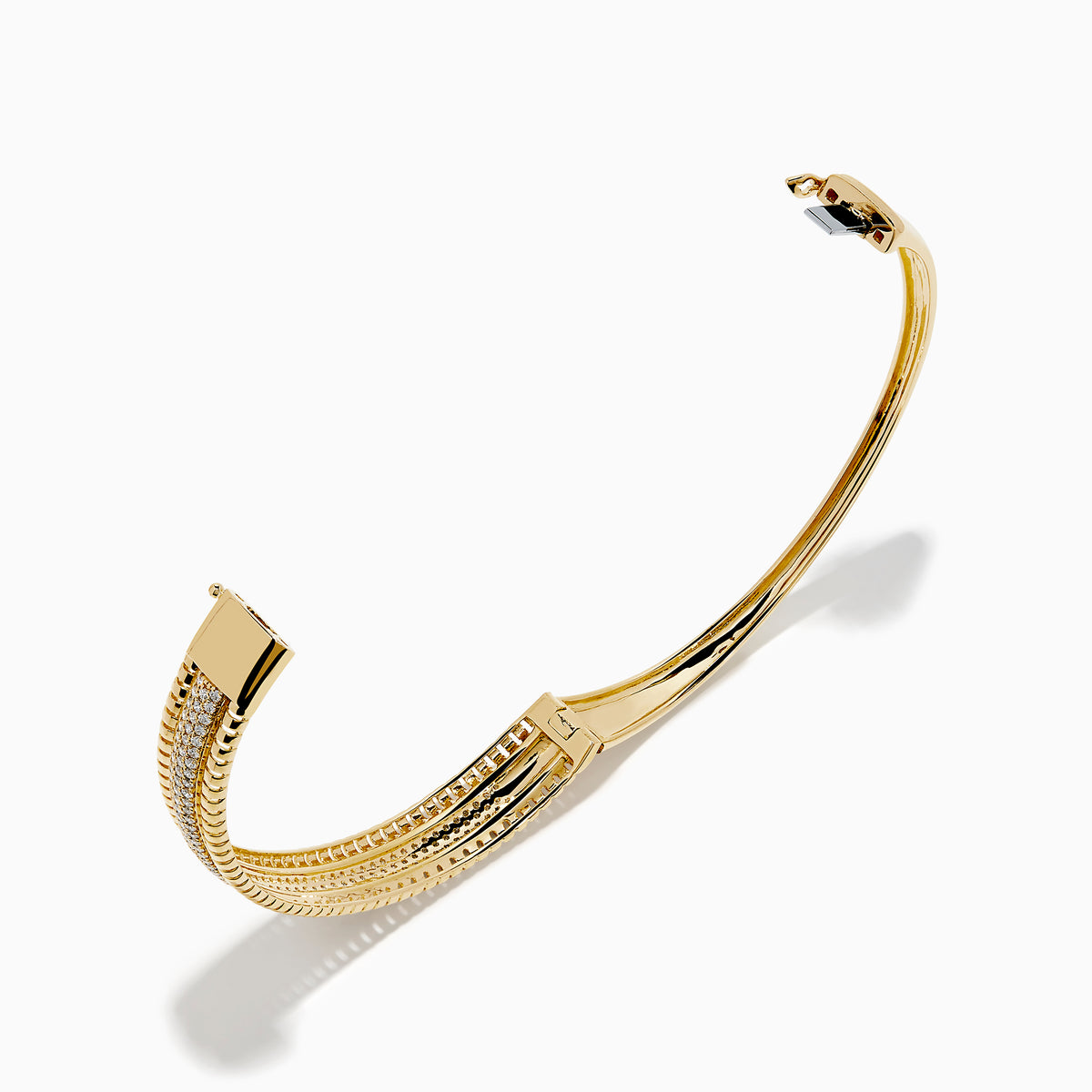 The D'Oro 14K Yellow Gold Diamond Bangle showcases rows of sparkling center diamonds, a textured border, and a secure hinged clasp for timeless elegance.