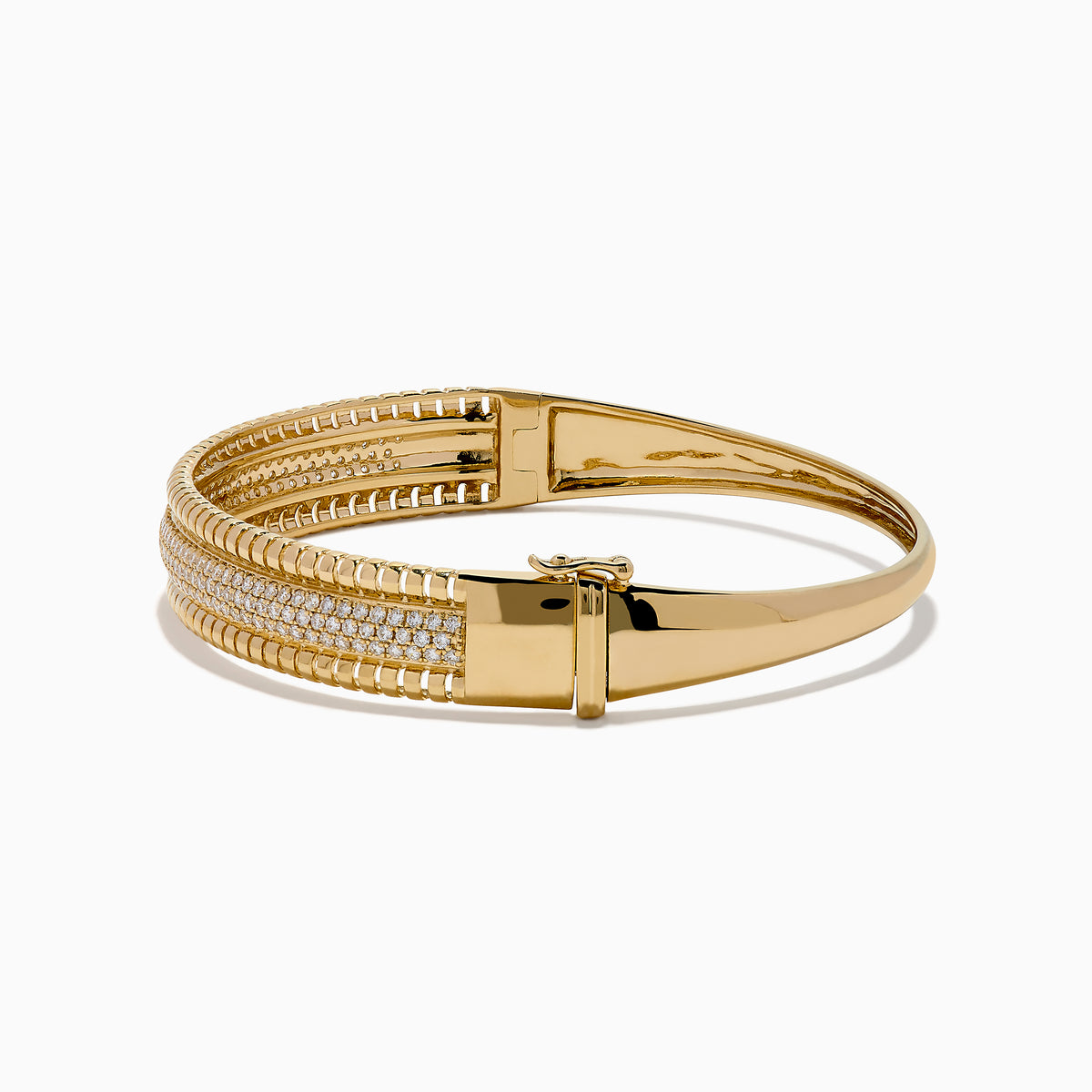 The D'Oro 14K Yellow Gold Diamond Bangle showcases rows of sparkling center diamonds, a textured border, and a secure hinged clasp for timeless elegance.