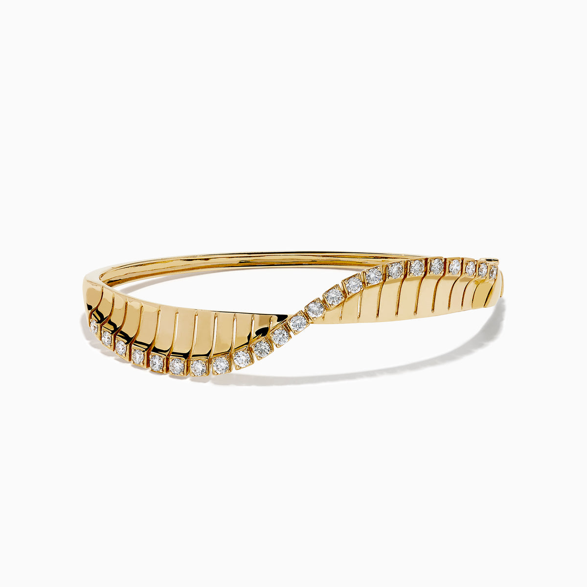 The 14K Yellow Gold Diamond Sculptural Twist Bangle features a wavy twist design with sparkling white diamonds set along the curve on a sleek gold background.