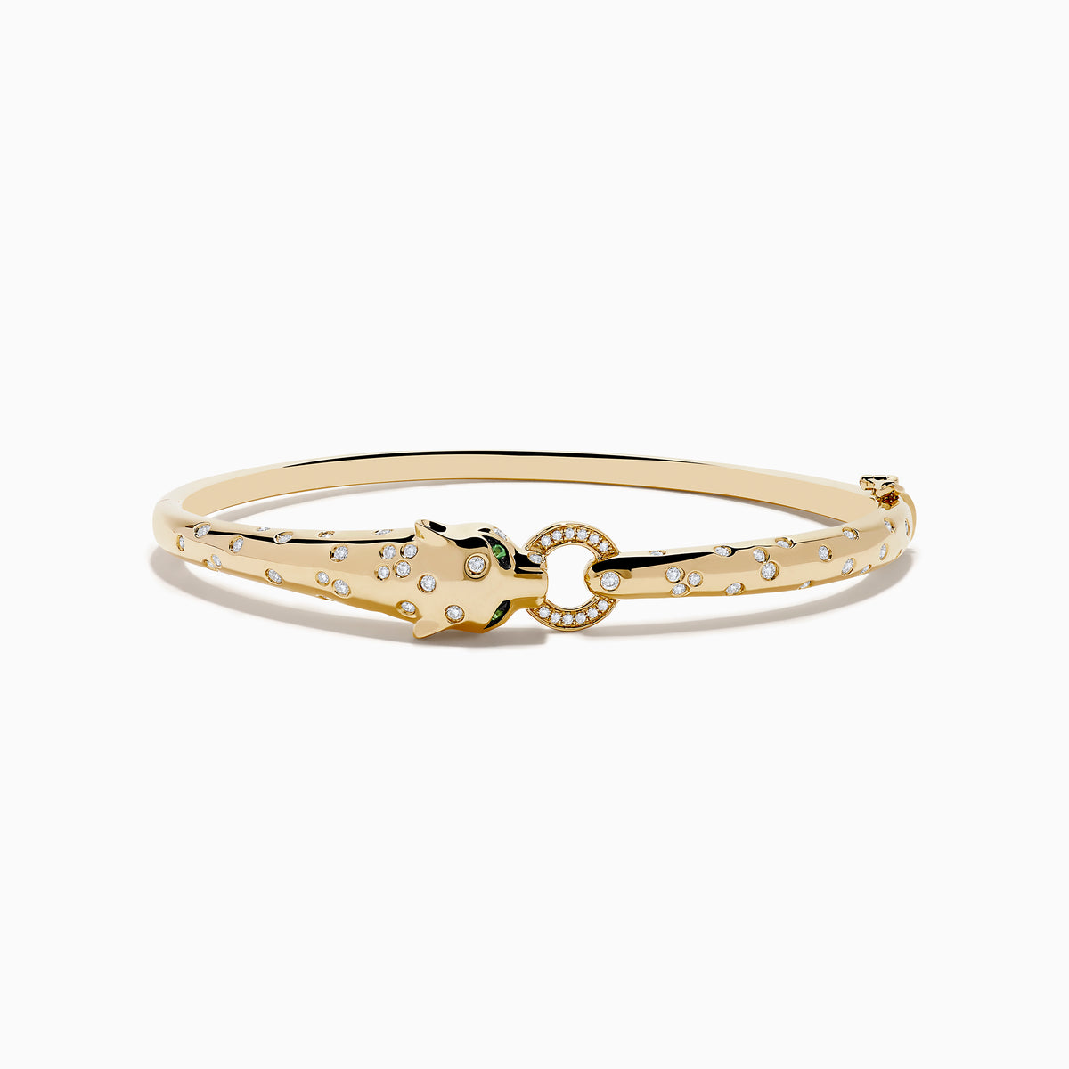 The Signature 14K Yellow Gold Diamond and Tsavorite Bangle features a panther’s head with tsavorite eyes, sparkling stones along the band, and a gem-encrusted circular link clasped in its mouth.