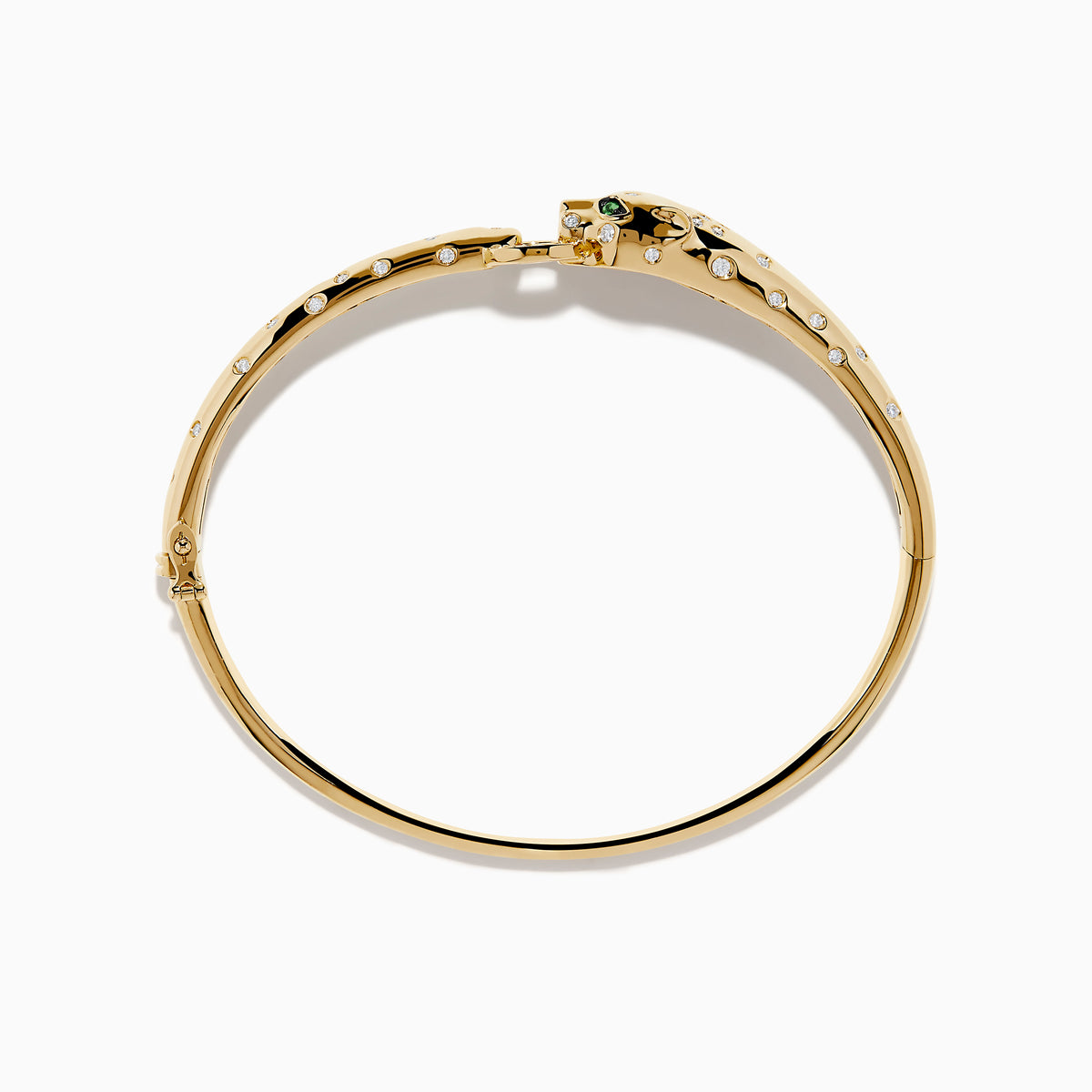 The Signature 14K Yellow Gold Diamond and Tsavorite Bangle features a panther’s head with tsavorite eyes, sparkling stones along the band, and a gem-encrusted circular link clasped in its mouth.