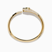 The Signature 14K Yellow Gold Diamond and Emerald Panther Open Bangle features a panther head and paw with diamond accents, emerald-green eyes, and black detailing on the face.