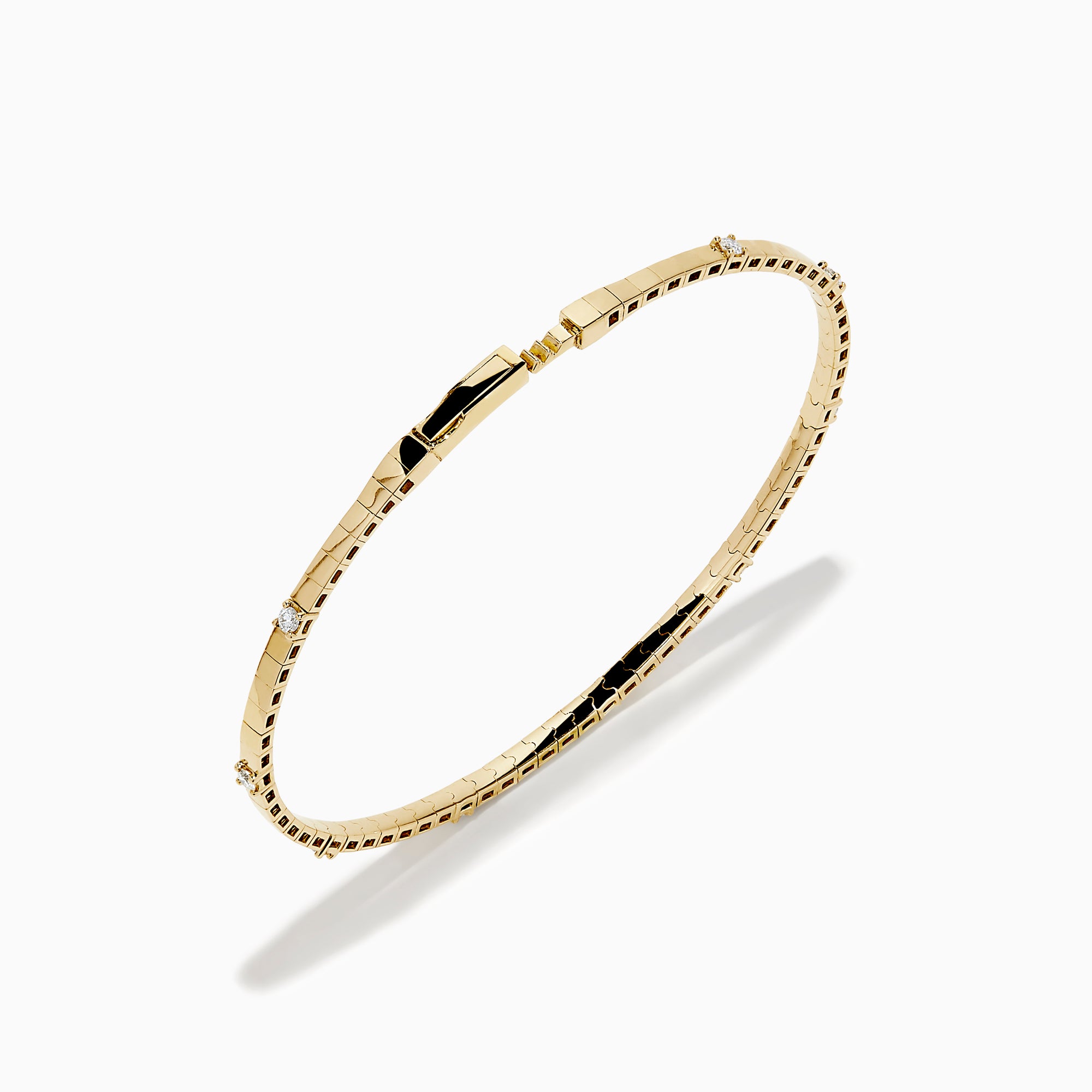 The 14K Yellow Gold Diamond Station Flexible Bangle features smooth rectangular links and evenly spaced round diamonds, offering minimalist elegance in a thin, flexible design perfect for any occasion.