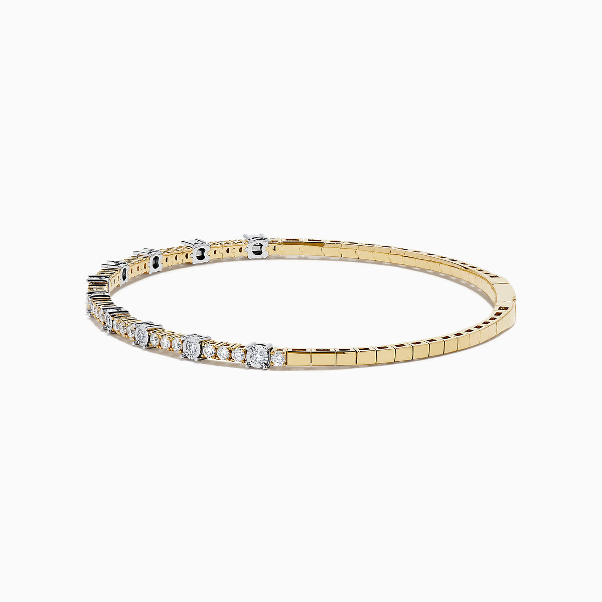 The 14K Two Tone Gold Diamond Station Flex Bangle features round white diamonds set along the top half, shown on a white background.