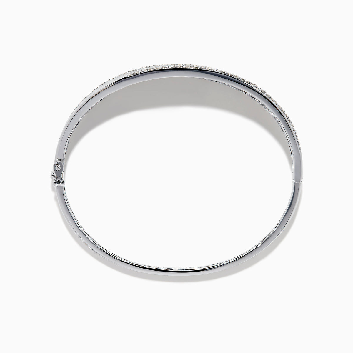 The 925 Sterling Silver Diamond Accented Bangle features a smooth, slightly curved center, two rows of sparkling stones along the edges, and a decorative lattice pattern inside.