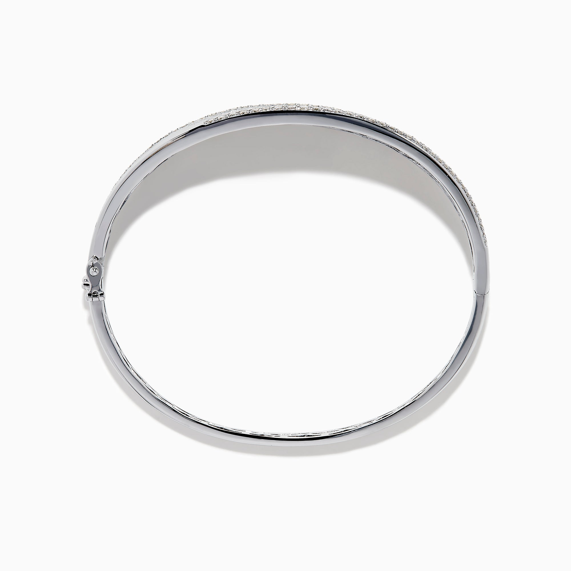 The 925 Sterling Silver Diamond Accented Bangle features a smooth, slightly curved center, two rows of sparkling stones along the edges, and a decorative lattice pattern inside.