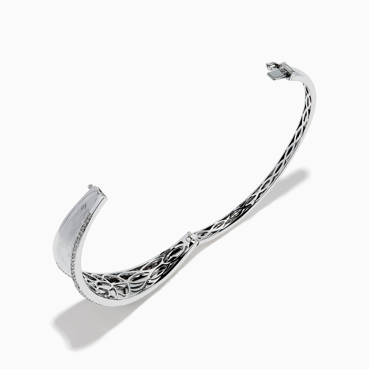 The 925 Sterling Silver Diamond Accented Bangle features a smooth, slightly curved center, two rows of sparkling stones along the edges, and a decorative lattice pattern inside.