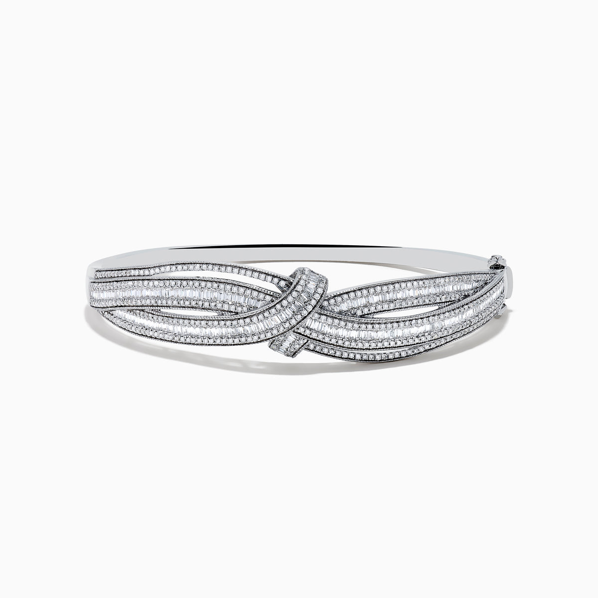 The Classique 14K White Gold Diamond Crossover Bangle features a twisted knot design with sparkling diamonds, shown against a plain white background.