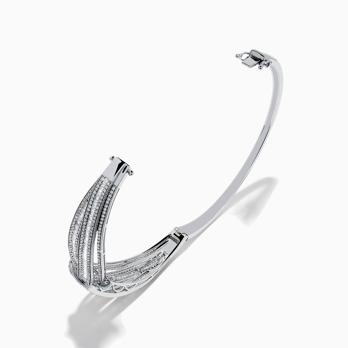 The Classique 14K White Gold Diamond Crossover Bangle features a twisted knot design with sparkling diamonds, shown against a plain white background.