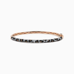 The Signature 14K Rose Gold Diamond Panther Print Bangle Bracelet features a textured band with black, silver, and gold panther print and a secure clasp for modern, effortless style.