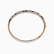 The Signature 14K Rose Gold Diamond Panther Print Bangle Bracelet features a textured band with black, silver, and gold panther print and a secure clasp for modern, effortless style.