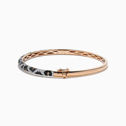 The Signature 14K Rose Gold Diamond Panther Print Bangle Bracelet features a textured band with black, silver, and gold panther print and a secure clasp for modern, effortless style.