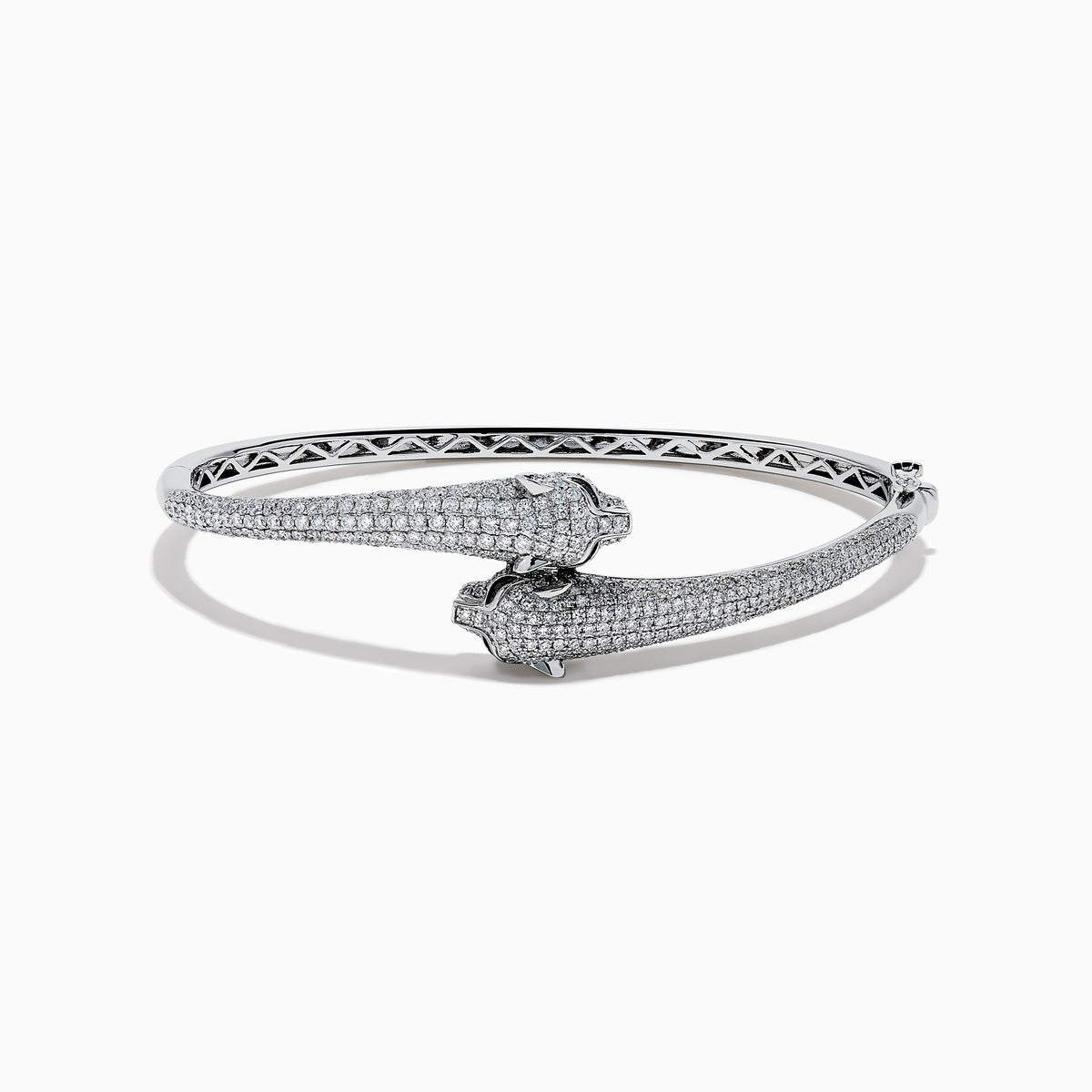 The Signature 14K White Gold White and Black Diamond Panther Bypass Bangle showcases two panther heads with sparkling diamond accents facing each other in an elegant, bypass-style design.