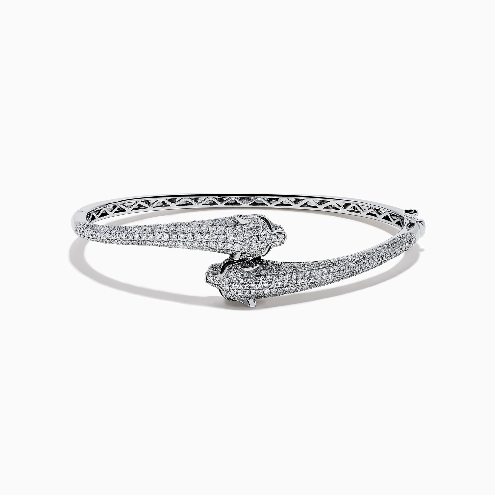 The Signature 14K White Gold White and Black Diamond Panther Bypass Bangle showcases two panther heads with sparkling diamond accents facing each other in an elegant, bypass-style design.