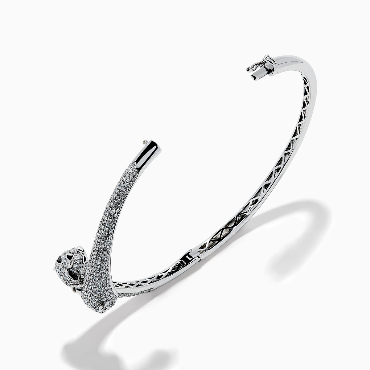 The Signature 14K White Gold White and Black Diamond Panther Bypass Bangle showcases two panther heads with sparkling diamond accents facing each other in an elegant, bypass-style design.