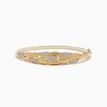 The 14K Yellow Gold Pave Diamond Bangle features alternating smooth gold and pavé diamond oval segments, shown on a white background.