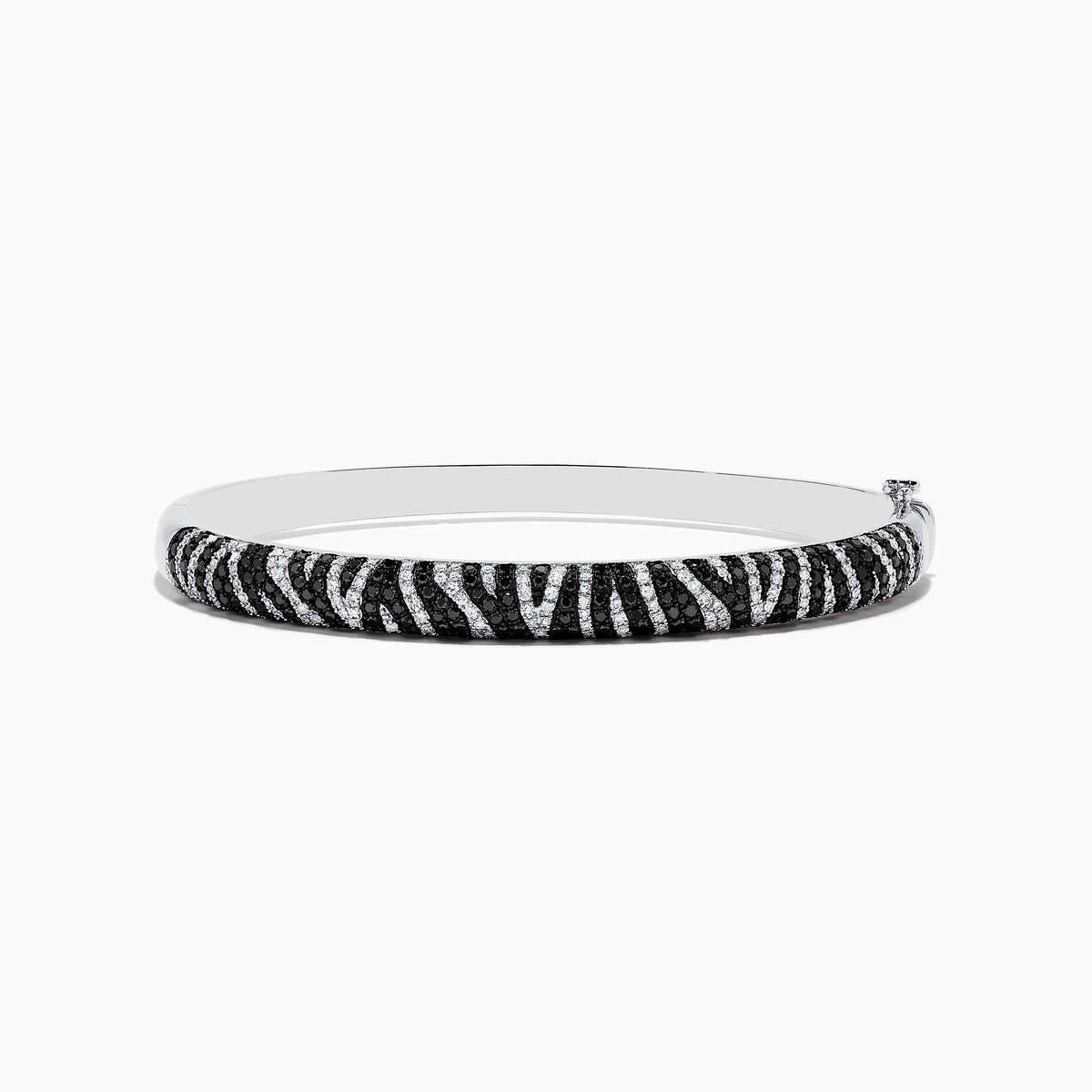 The 14k White Gold Black and White Diamond Zebra Print Bangle features a striking zebra stripe design with black and white diamond accents, elegantly set against plain white gold.