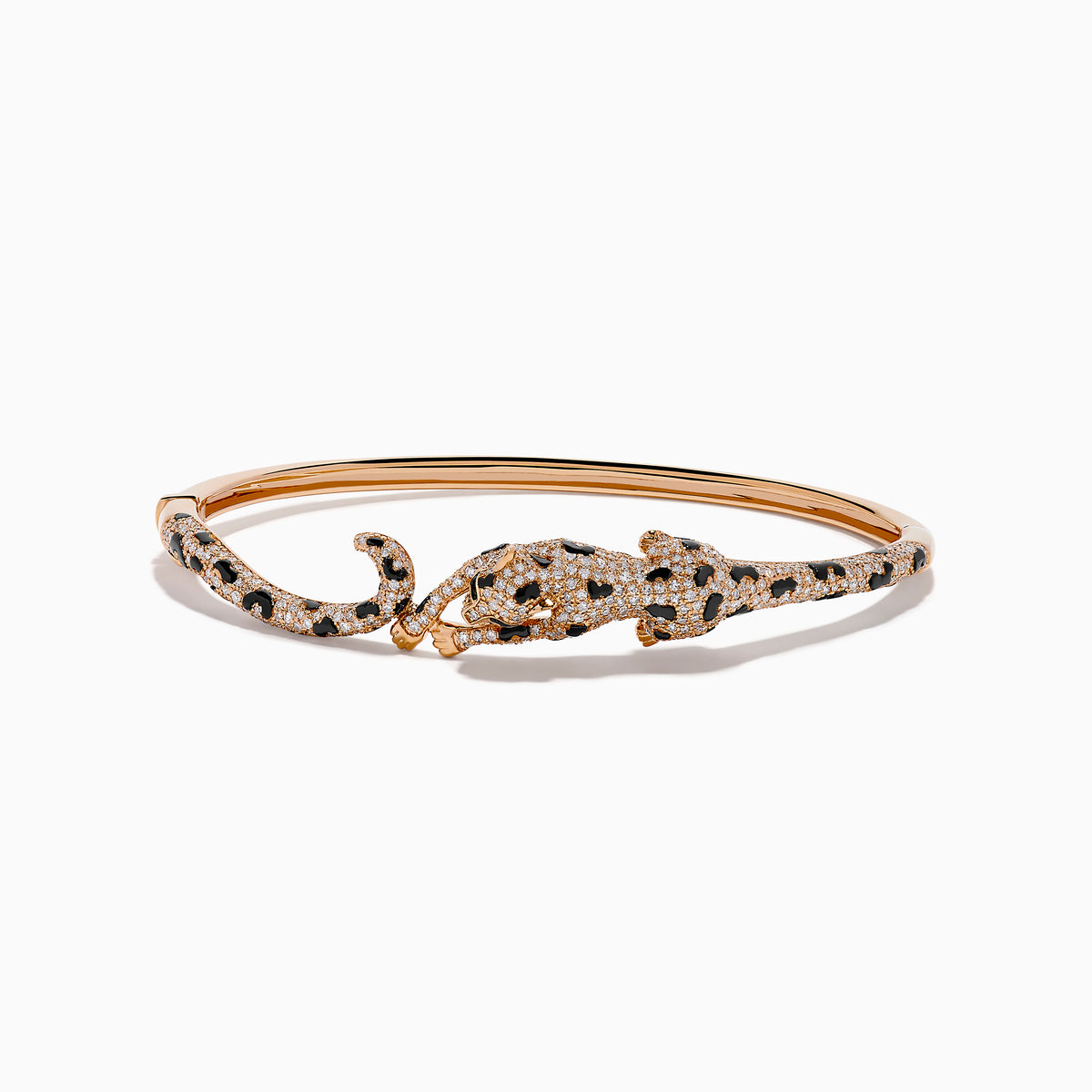 The Signature 14K Rose Gold Diamond and Emerald Panther Bangle features a panther design with its head and tail meeting at the front, adorned with sparkling diamonds and emeralds.