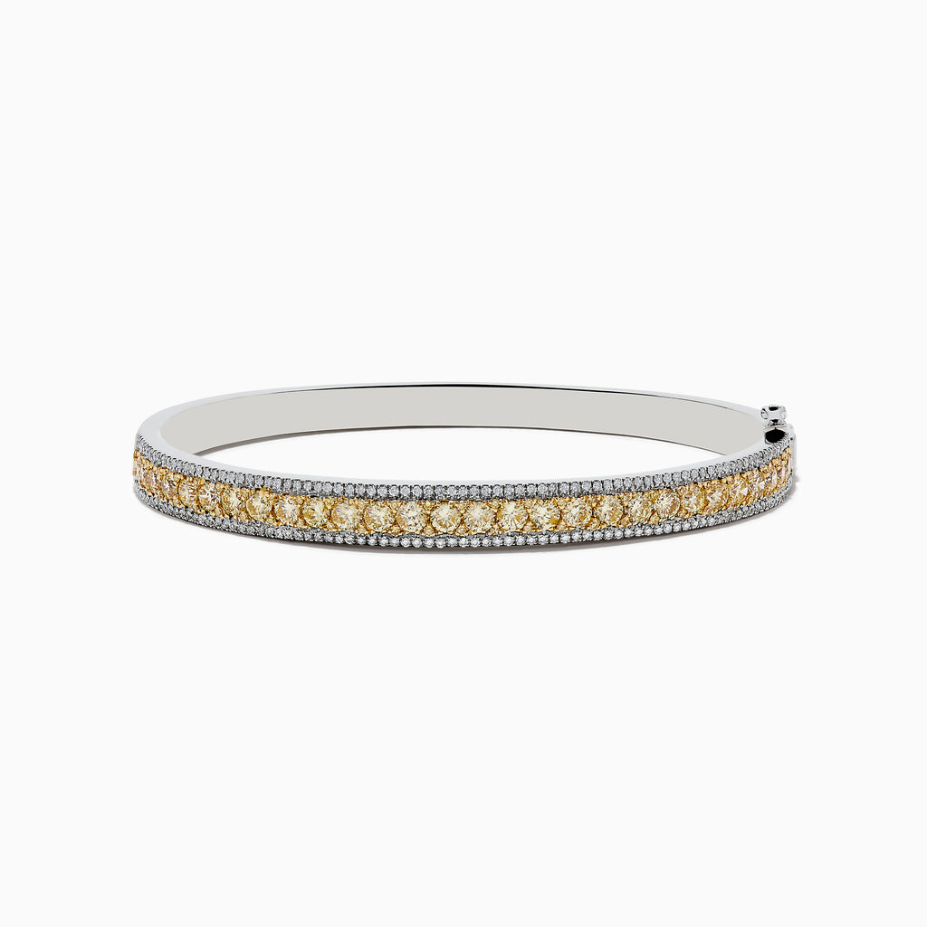 The Canare 14k White Gold Yellow Diamond Bangle 3.40 TCW features a center row of yellow diamonds flanked by two rows of small white diamonds, displayed against a plain white background.