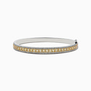 The Canare 14k White Gold Yellow Diamond Bangle 3.40 TCW features a center row of yellow diamonds flanked by two rows of small white diamonds, displayed against a plain white background.