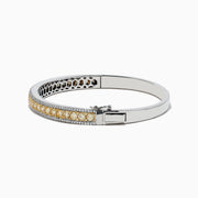 The Canare 14k White Gold Yellow Diamond Bangle 3.40 TCW features a center row of yellow diamonds flanked by two rows of small white diamonds, displayed against a plain white background.