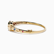 The Signature 14K Yellow Gold Multi Sapphire and Diamond Panther Bangle features two interlocking panther head motifs at the center, adorned with colorful sapphires and small diamonds.