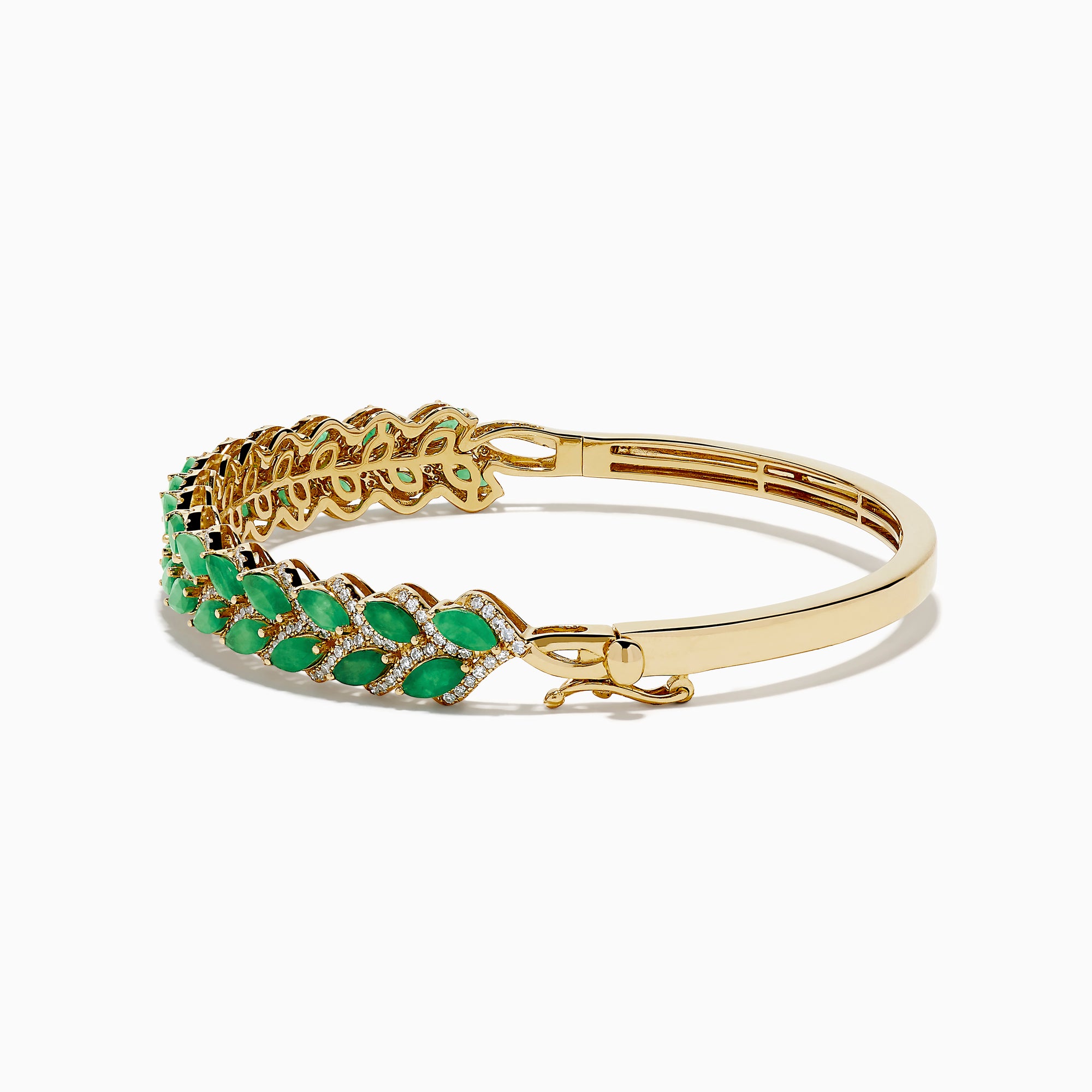 The 14K Yellow Gold Emerald and Diamond Marquise Leaf Bangle showcases an intricate leaf design with alternating emeralds and diamonds set along the band.