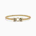 Introducing the Signature 14K Yellow Gold Diamond Chain-Link Panther Bangle Bracelet—a bold reinterpretation of the classic diamond bangle. This striking piece showcases an elegant chain-link design in 14K yellow gold, featuring two intricately sculpted panther heads adorned with green and clear gemstones, joined at the center by a sparkling, circular, gem-encrusted link.