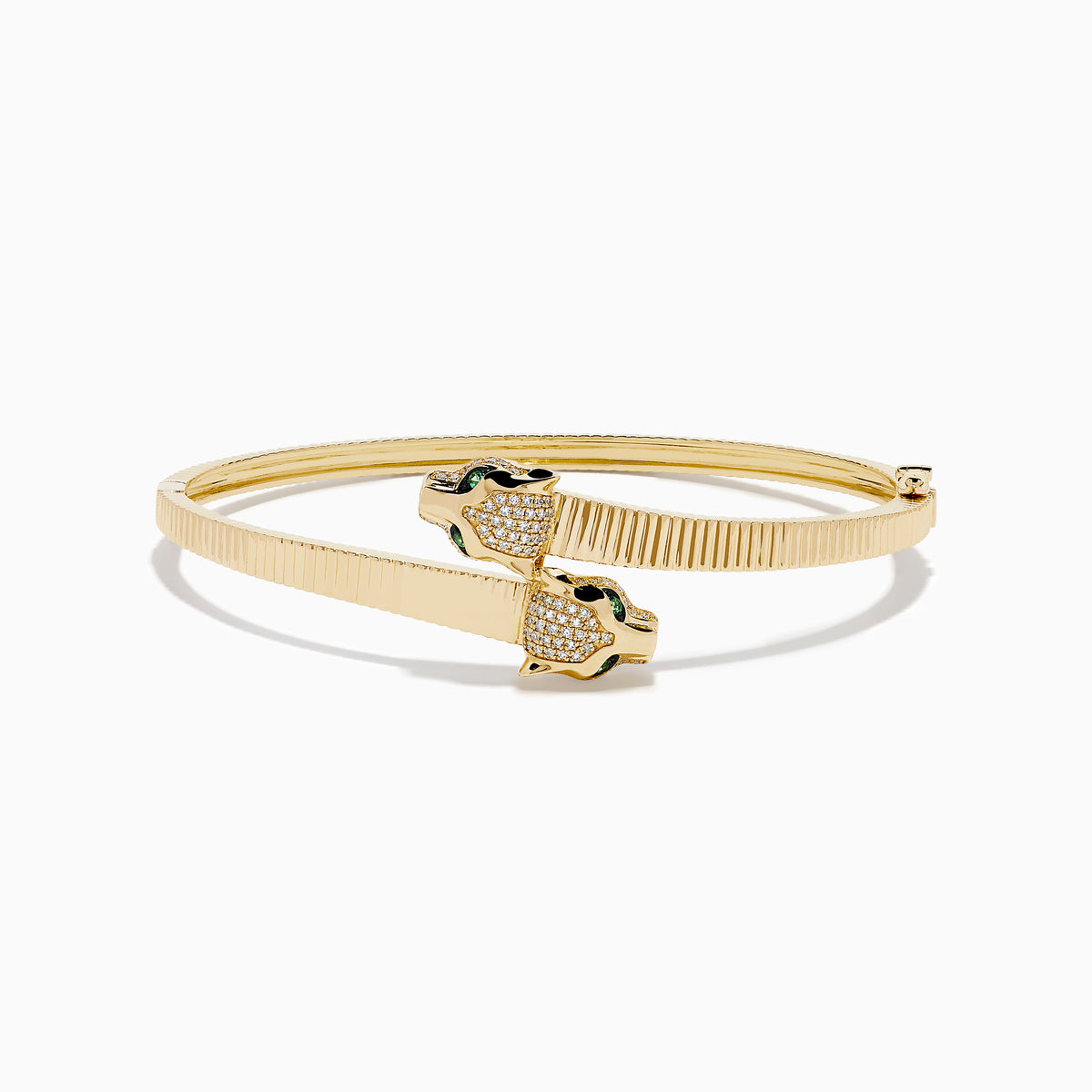 The Signature 14K YGold Diamond and Emerald Panther Bypass Bangle features twin panther heads with emerald eyes, diamond accents, and a textured ribbed band for a distinct, elegant look.