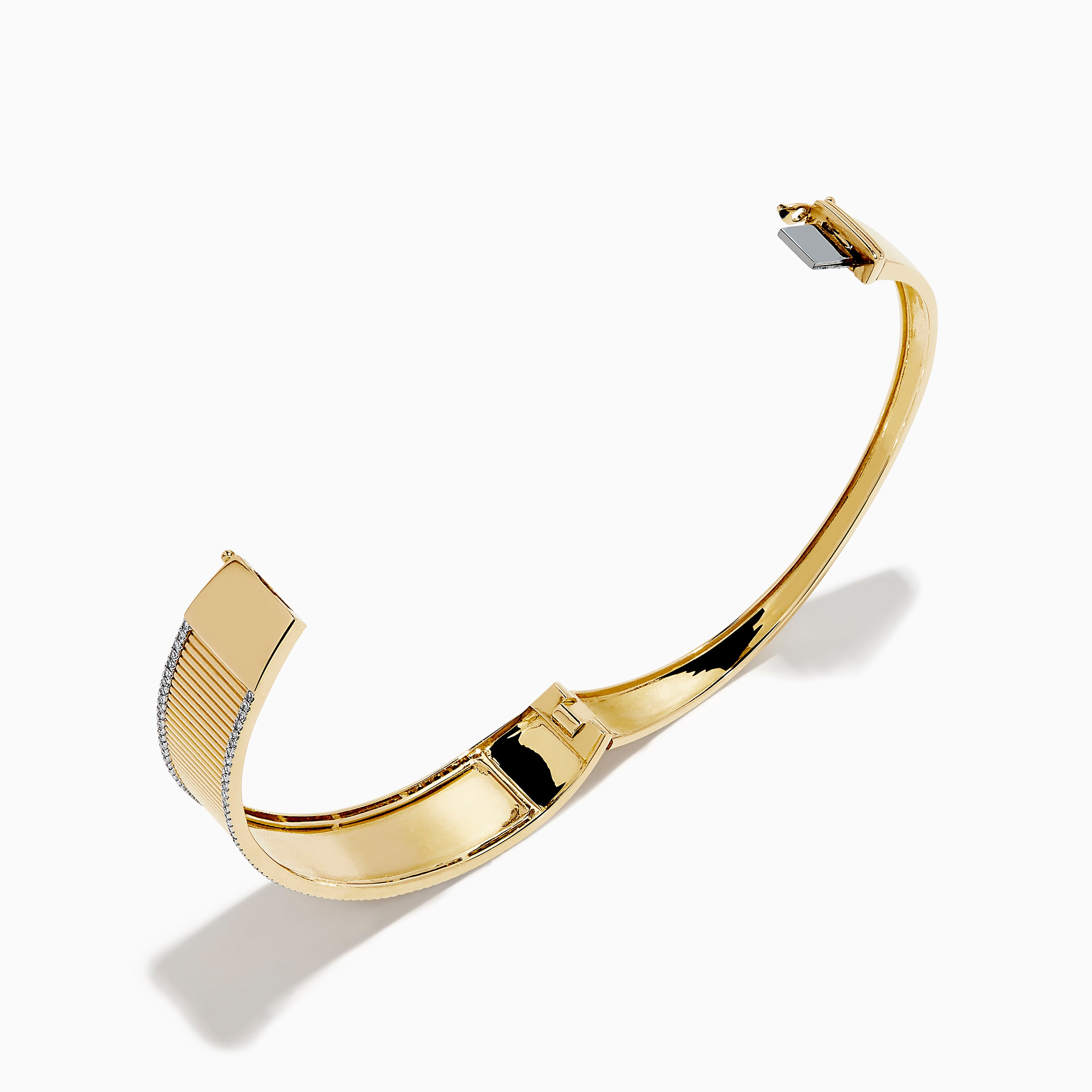 The DOro 14K Yellow Gold Diamond Bangle showcases a textured vertical striped design with sparkling diamonds bordering the top and bottom edges.