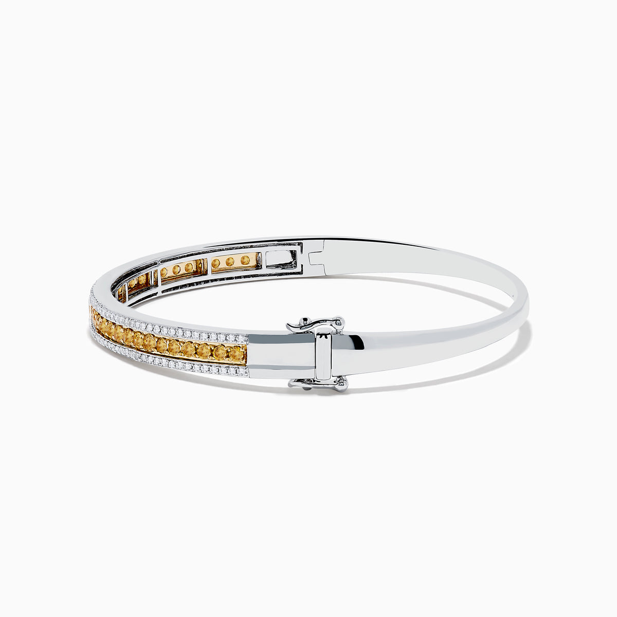 The Canare` 14K Two Tone Yellow and White Diamond Bangle features a central row of yellow diamonds bordered by sparkling white diamonds, all set in a stylish silver bracelet against a clean white background.