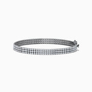 The 14K White Gold 3-Row Diamond Pave Bracelet showcases sparkling round diamonds in a symmetrical, elegant design, displayed against a white background.