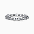 The Classique 14K White Gold Diamond Bracelet features interlocking H-shaped links and is adorned with sparkling diamonds, offering a polished, luxurious look.