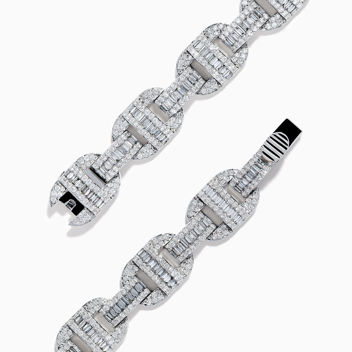 The Classique 14K White Gold Diamond Bracelet features interlocking H-shaped links and is adorned with sparkling diamonds, offering a polished, luxurious look.