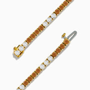 The Espresso 14K Yellow Gold Brown and White Diamond Tennis Bracelet features a single row of alternating brown and white diamonds, showcased against a plain white background.