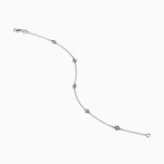 The Pave Classica 14K White Gold Diamond Bezel Station Necklace and Bracelet Set features small, evenly spaced round diamond accents, beautifully displayed on a plain white background.