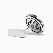 Men's 925 Sterling Silver Onyx Compass Cuff Links featuring a raised compass rose on a black onyx background are displayed on a white surface.