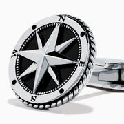 Men's 925 Sterling Silver Onyx Compass Cuff Links featuring a raised compass rose on a black onyx background are displayed on a white surface.