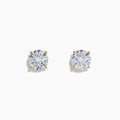 The Lab Grown Round Diamond 4.00ct Glam Stud Earrings in 14K Yellow Gold are shown with clear round diamonds set in yellow gold prongs on a plain white background.