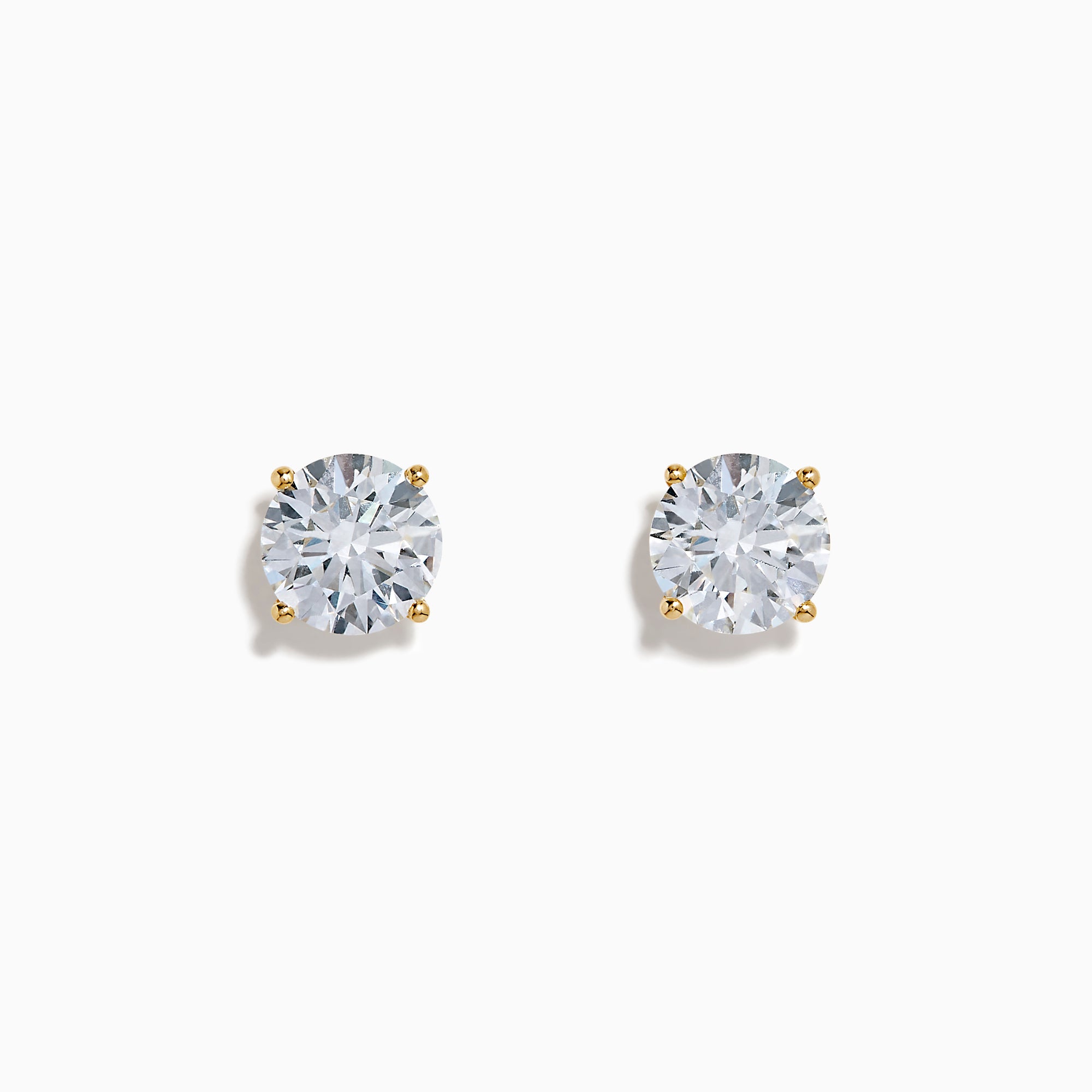 The Lab Grown Round Diamond 4.00ct Glam Stud Earrings in 14K Yellow Gold are shown with clear round diamonds set in yellow gold prongs on a plain white background.