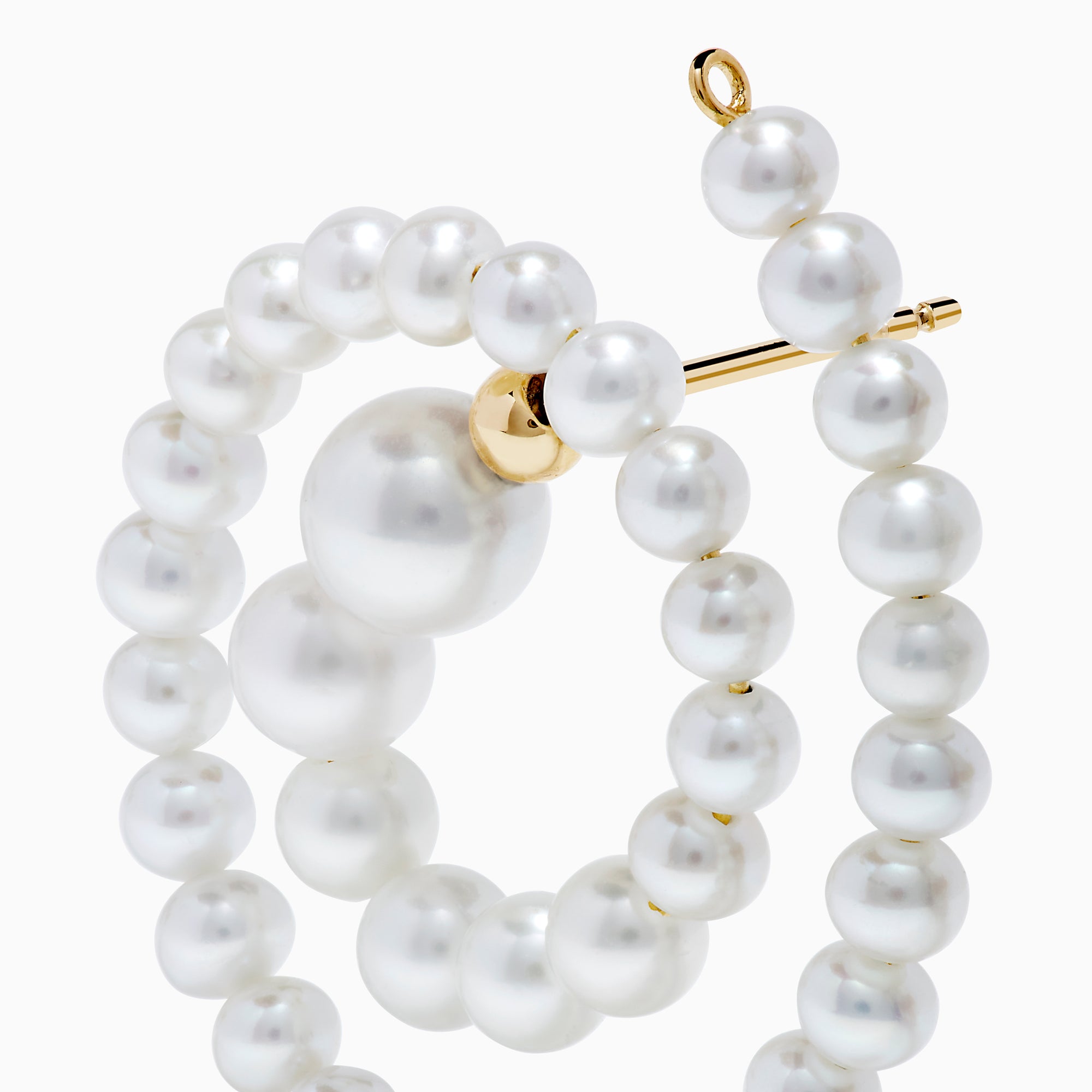 The 14K Yellow Gold Freshwater Pearl Spiral Earrings feature small freshwater pearls and gold accents, displayed on a white background.