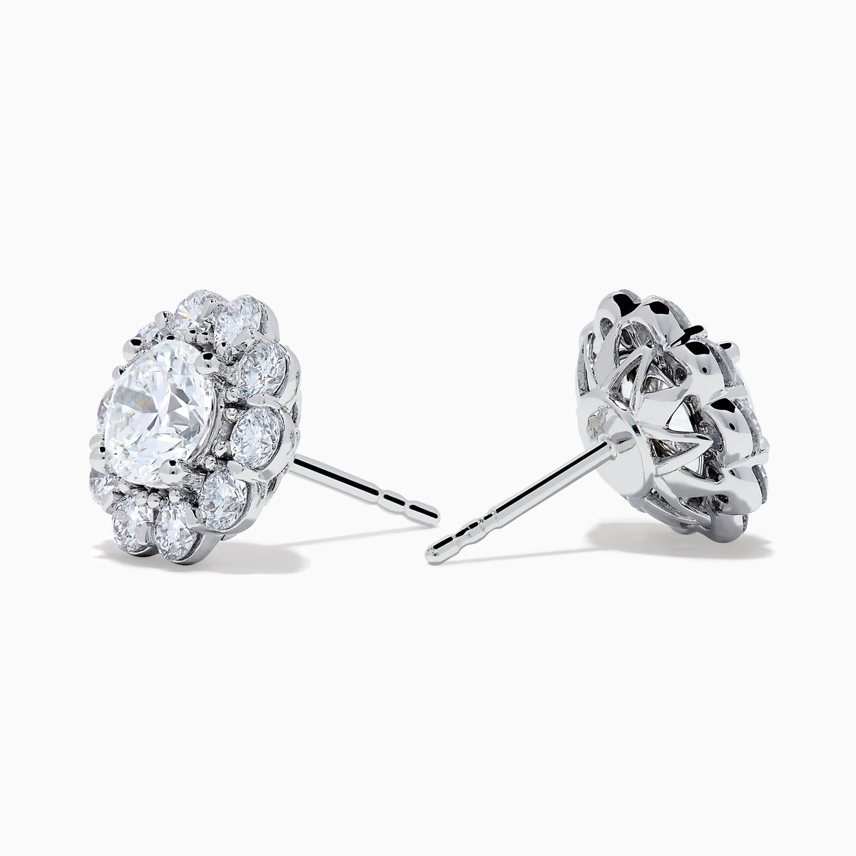 The Star Lab Grown Diamond Fleur Stud Earrings feature a central round diamond with a floral halo of smaller diamonds, beautifully set in 18K white gold for a timeless look.