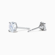 The Star Lab Grown Diamond Stud Earrings in 18K White Gold feature round lab diamonds in classic prong settings, elegantly displayed against a plain white background.