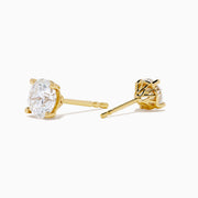 The Star Lab Grown Diamond Stud Earrings in 18K Yellow Gold feature round lab diamonds set in yellow gold prongs, shown against a plain white background.