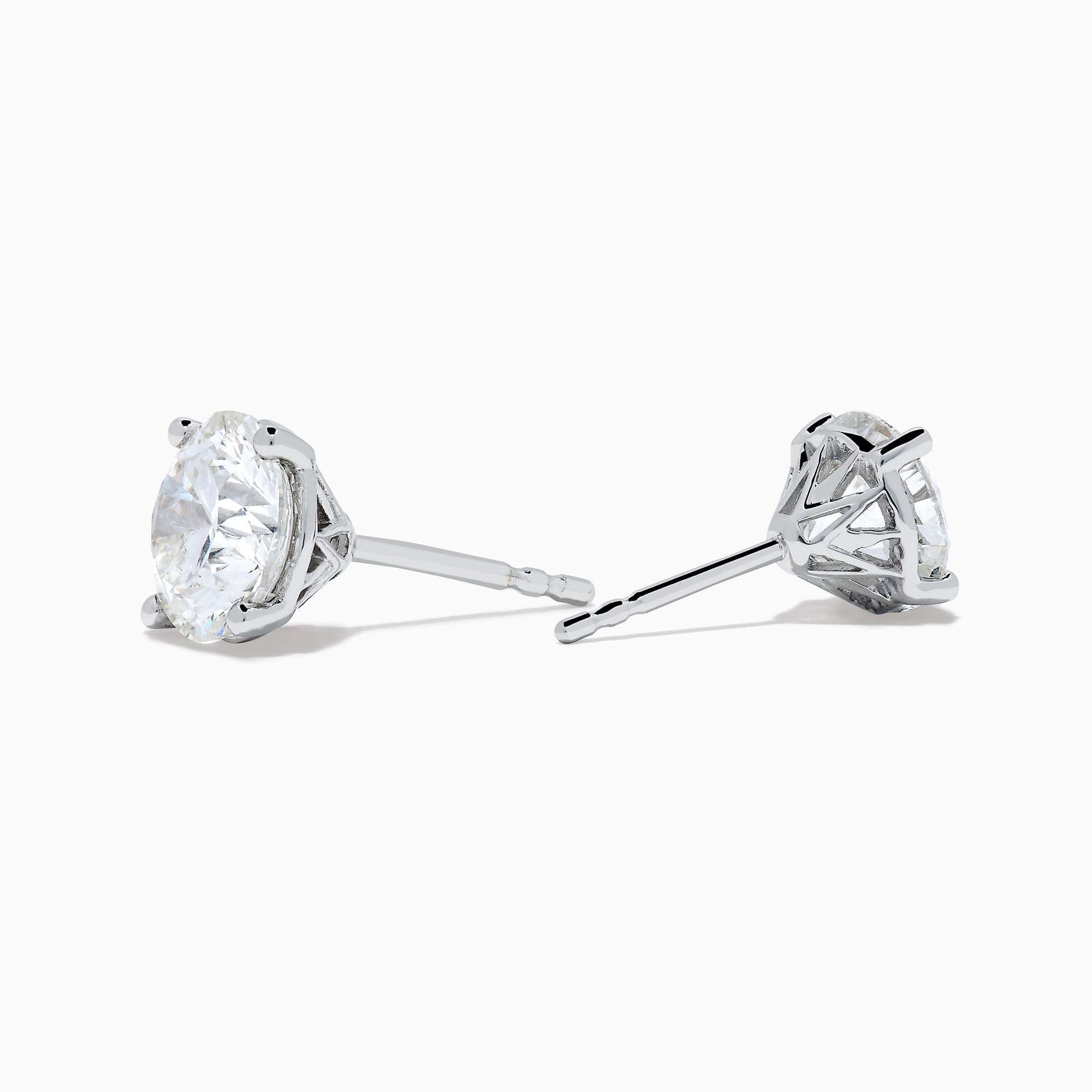 The Star Lab Grown Diamond Stud Earrings feature round, clear lab diamonds set in elegant four-prong 18K white gold settings, shown on a white background.