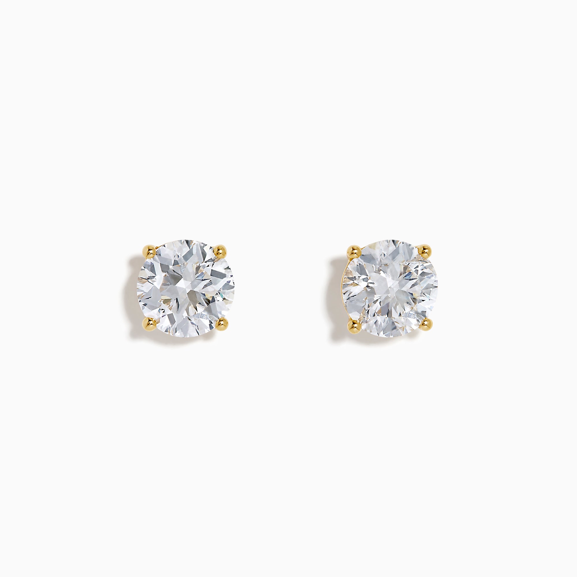 The Star Lab Grown Diamond Stud Earrings in 18K yellow gold feature round, clear lab diamonds in prong settings, shown against a white background.