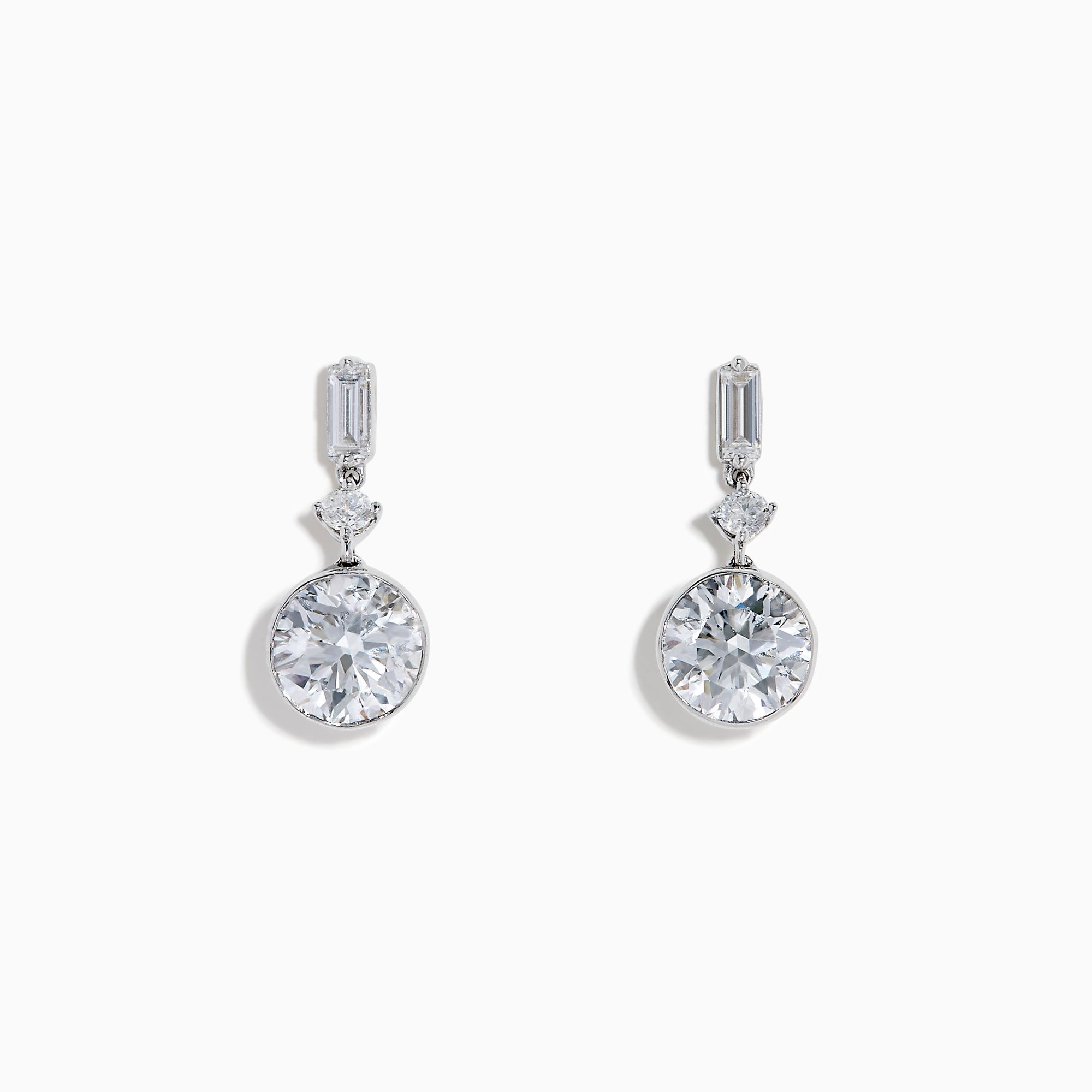 Star Lab Grown Diamond Bezel Solitaire Drop Earrings in 18K White Gold feature a round diamond at the bottom, a marquise-shaped diamond in the middle, and a rectangular diamond at the top, all set against a white background.