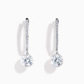 Star Lab Grown Diamond Pave Hoop Solitaire Earrings in 18K White Gold, featuring pavé-set diamonds along the hoop and a large round solitaire gem at the end, displayed on a white background.