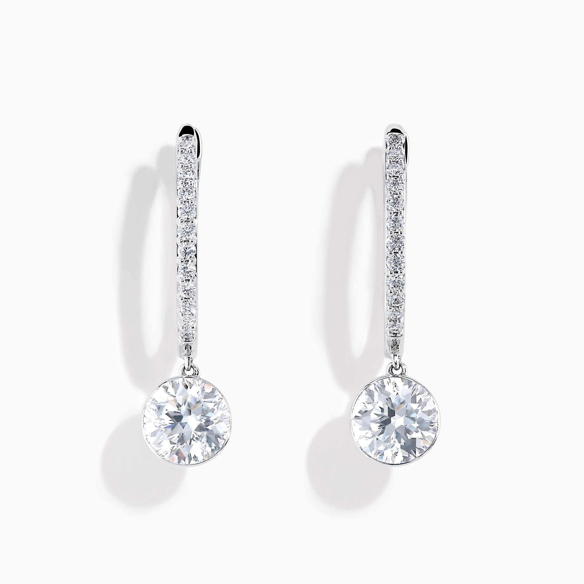 Star Lab Grown Diamond Pave Hoop Solitaire Earrings in 18K White Gold, featuring pavé-set diamonds along the hoop and a large round solitaire gem at the end, displayed on a white background.